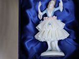 the figurine is in a box on the table