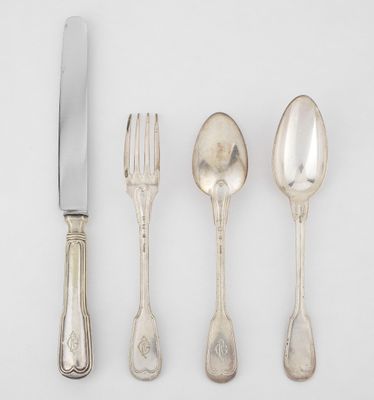 three spoons, a knife, and a fork on a white surface