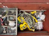 a wooden box filled with assorted items and tools