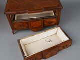 two pieces of furniture including a dresser and a drawer