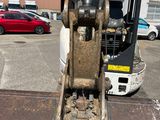 an image of a forklift in a parking lot