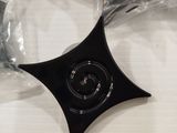 a close up of a black object on a table