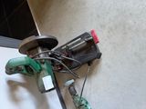 a machine that is sitting on the floor next to a wall