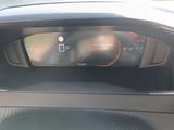 a car dashboard with a digital display on it