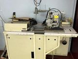a machine that is sitting on a table in a room