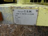 a close up of a sign on the back of a truck