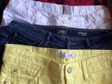 several pairs of shorts are stacked on top of each other