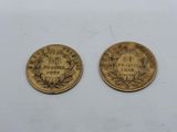 two gold coins, one of which has a crown and the other of which is a crown