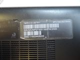 a close up of a laptop with a barcode on it