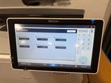 a computer that is sitting on top of a printer