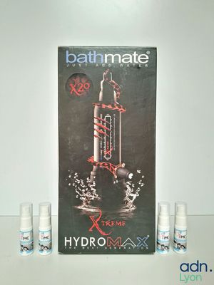 three bottles of bathmate next to each other on a table