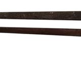 pair of two old iron swords on a white background