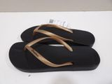pair of black and gold flip flop flop flop flop flop flop flop flop flop flop flop flop flop flop flop