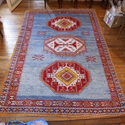 a rug on the floor in a living room
