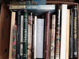 a box full of books that are sitting on a table