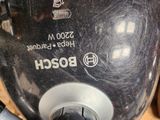 a close up of a black and white blender on a table