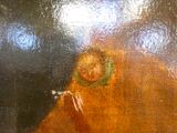 une peinture représentant une femme tenant un oiseau dans sa main