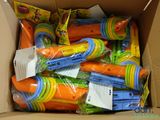 a cardboard box filled with lots of colorful plastic toys