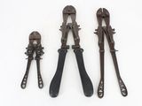 three different types of pliers on a white surface with a white background