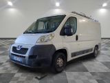 a white van that is parked in a room