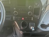 a car dashboard with a bunch of items in it
