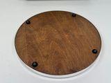 an image of a wooden toilet seat with buttons on it