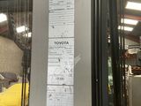 a picture of a toyota forklift in a warehouse