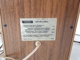 a close up of a wooden box with a label on it
