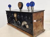 an old fashioned radio that is on display on a table