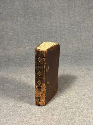 a small book that is sitting on a table