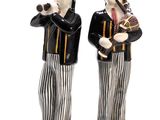 two figurines of two men playing musical instruments
