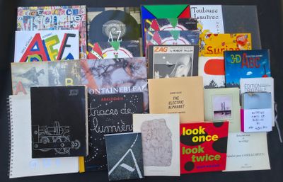 a lot of books that are on a table