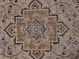a close up of a rug with a flower design on it