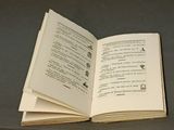 an open book that is sitting on a table