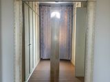 a mirror on the wall in the hallway of a house