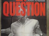 a poster of a man in a white shirt is on a wall