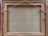 an old picture frame with a rope hanging from it ' s side