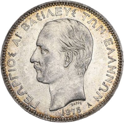 Gros plan sur une pièce de monnaie portant le visage d'un homme