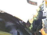 a close up of a person holding a pair of scissors