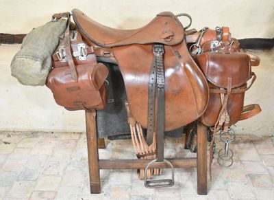 a saddle with several different types of saddles on it