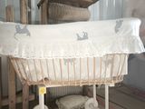 a baby ' s crib in the corner of a room