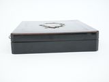 a small black box with a picture of a star on it