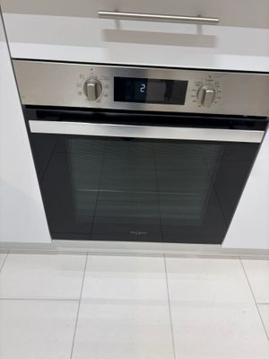 a oven that is built into the wall in the kitchen