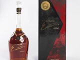 a bottle of glenmore ' s finest reserve whisky next to a box