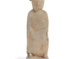 statue of a woman with a dog on her head