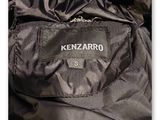 the jacket is black and has a white label on it