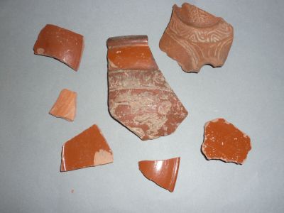 several pieces of clay sitting on top of a table next to each other