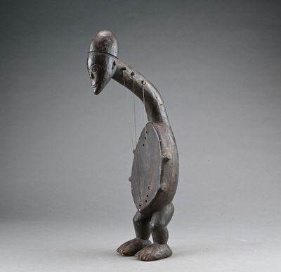 an image of a sculpture of a person with a helmet on