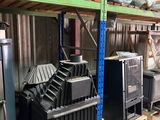 many different types of appliances on the shelves in the warehouse