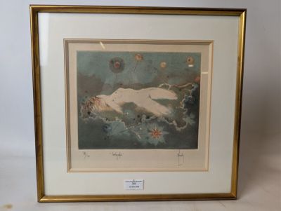 an image of a framed picture of a woman laying on a bed